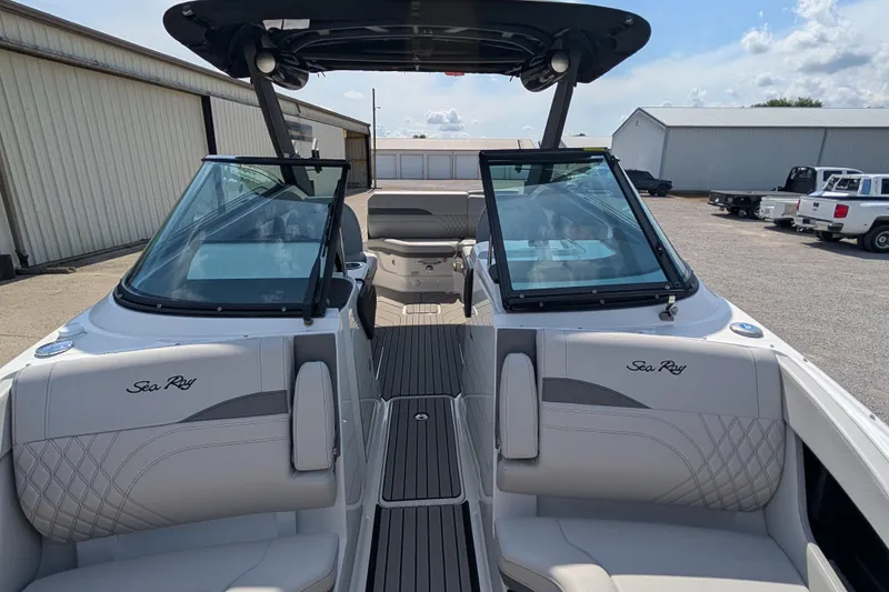 Slide: The Image of 2025 Sea Ray SLX 260 Surf boat interior with sleek design and comfortable seating. - 13