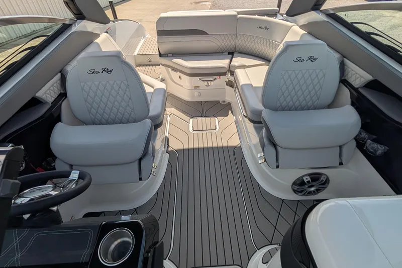 Slide: The Image of 2025 Sea Ray SLX 260 Surf boat interior with luxurious seating and modern design. - 14