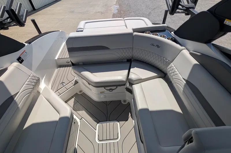 Slide: The Image of 2025 Sea Ray SLX 260 Surf boat interior with luxurious seating and modern design. - 15