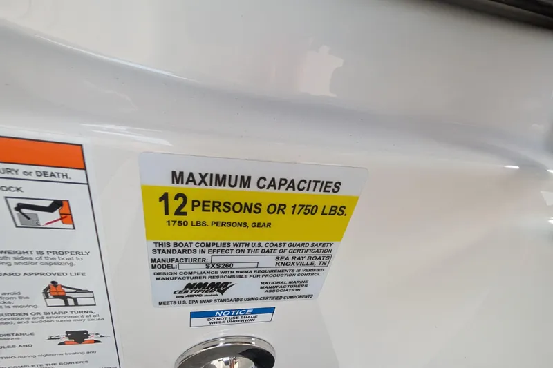 Slide: The Image of Sea Ray SLX 260 Surf 2025 capacity label, 12 persons or 1750 lbs limit. - 20