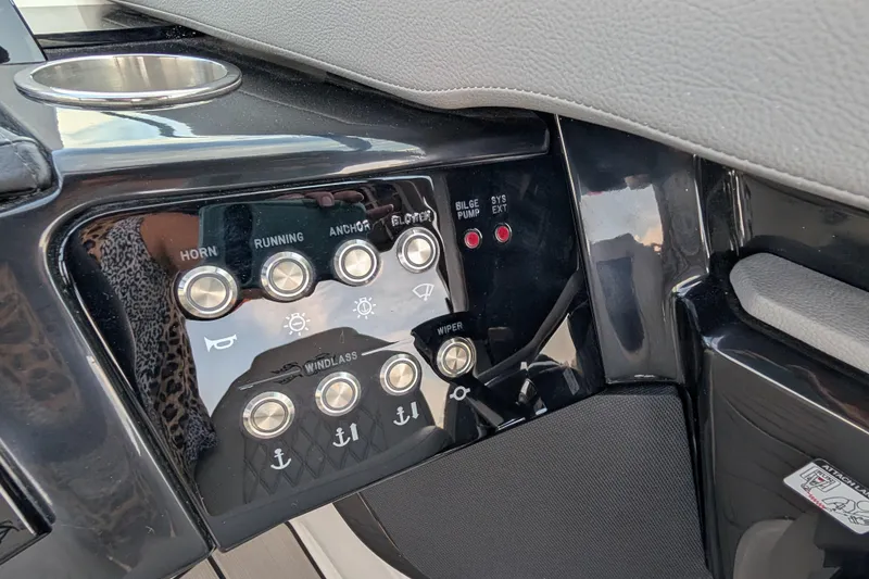 Slide: The Image of Control panel of 2025 Sea Ray SLX 260 Surf boat with labeled buttons and indicators. - 21