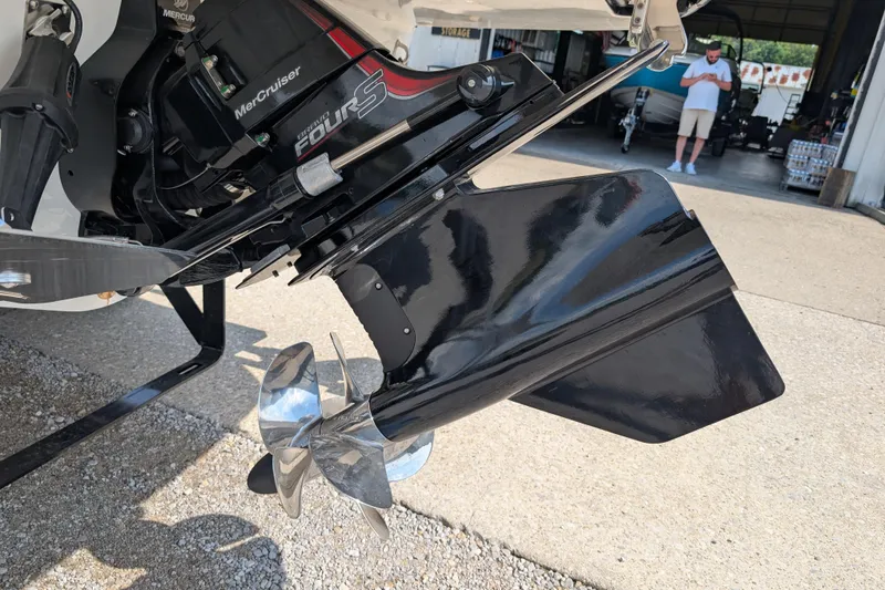 Slide: The Image of Close-up of 2025 Sea Ray SLX 260 Surf boat's MerCruiser engine and propeller. - 5