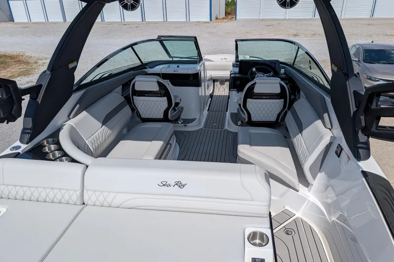 Slide: The Image of 2025 Sea Ray SLX 260 Surf boat interior with luxurious seating and modern design. - 7