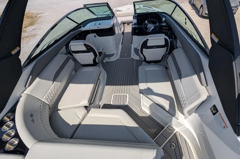 Slide: The Image of Luxurious interior of 2025 Sea Ray SLX 260 Surf boat with elegant seating and modern design. - 8