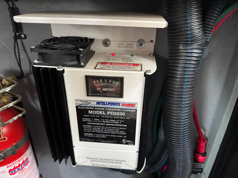 Slide: The Image of Marine battery charger in a 2003 Sea Ray 320 Sundancer boat. - 32