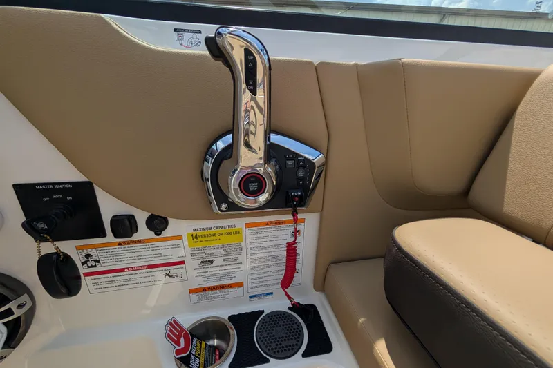 Slide: The Image of Control panel of 2025 Sea Ray SDX 250 boat with ignition and safety features. - 24