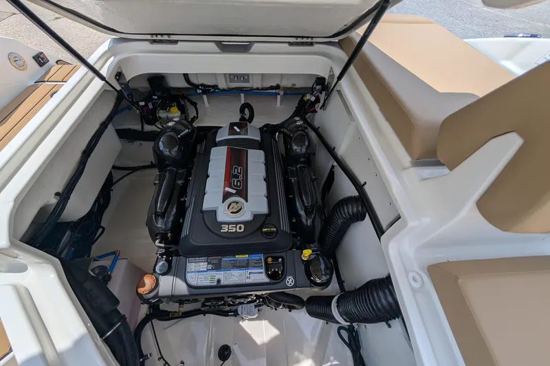 Slide: The Image of 2025 Sea Ray SDX 250 boat engine compartment with 6.2L 350 horsepower engine. - 33