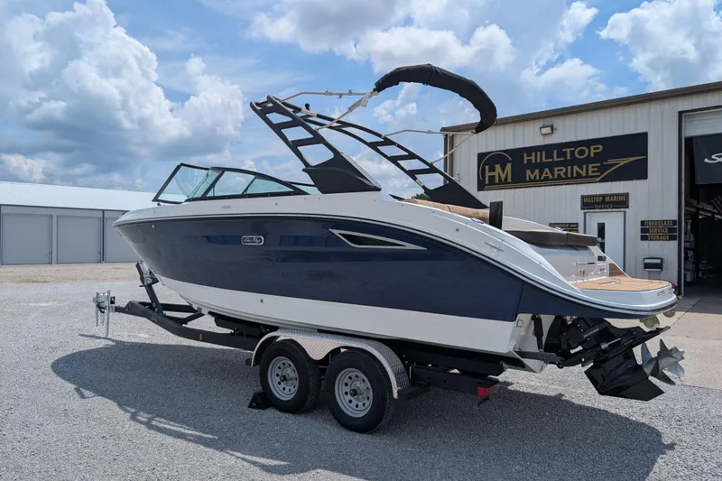 Slide: The Image of 2025 Sea Ray SDX 250 boat on trailer at Hilltop Marine dealership. - 6