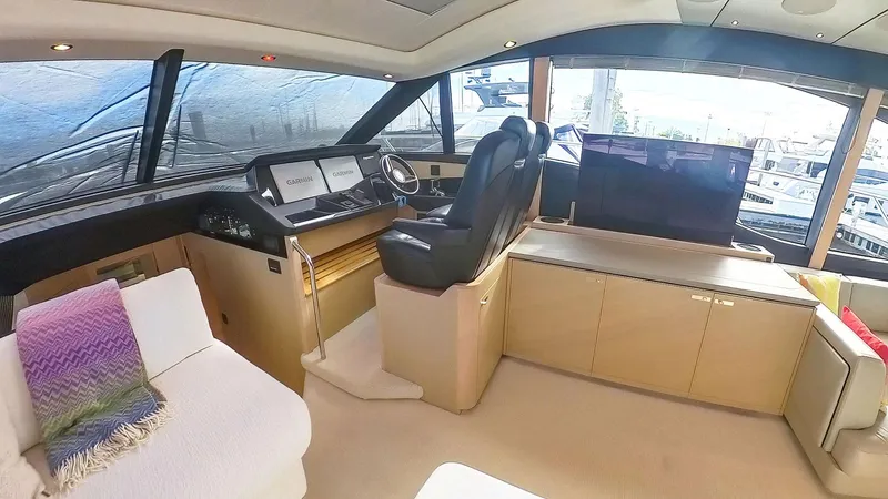 Slide: The Image of Luxurious interior of a 2018 Princess S60 yacht with modern helm and seating area. - 44