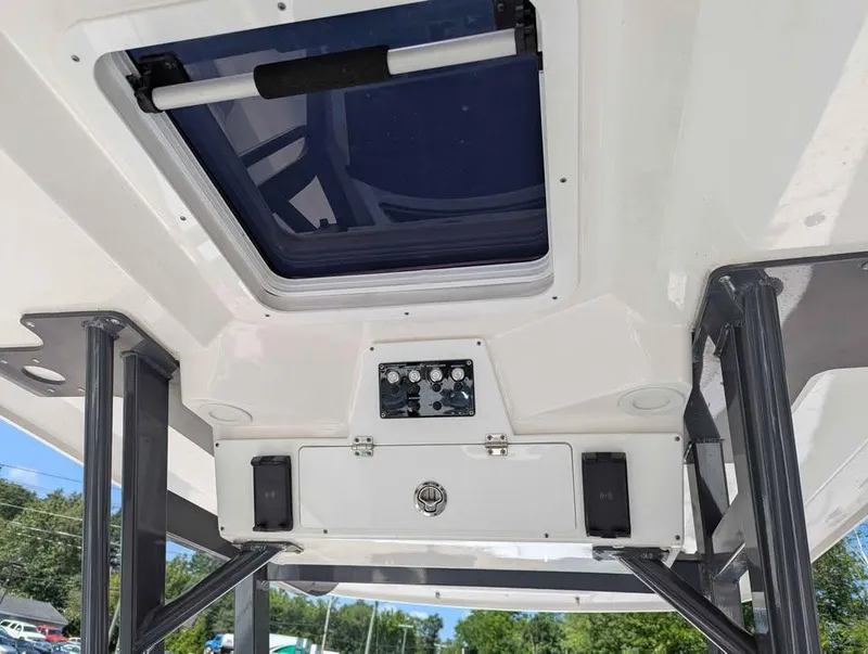 Slide: The Image of 2024 Sea Fox 288 Commander boat roof with hatch and control panel. - 12
