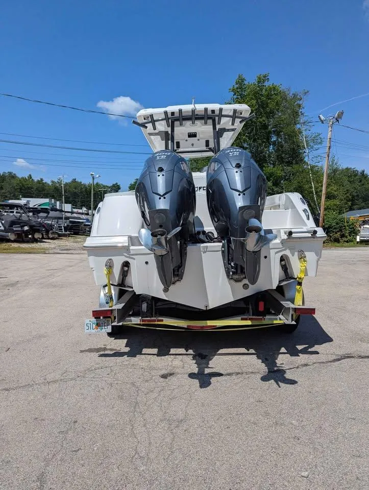 Slide: The Image of 2024 Sea Fox 288 Commander boat with dual outboard engines on a trailer. - 3