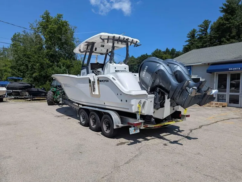 Slide: The Image of 2024 Sea Fox 288 Commander boat on trailer with dual Yamaha outboard engines. - 4
