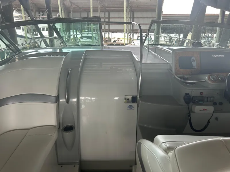 Slide: The Image of 2007 Formula 31 PC boat cockpit with steering controls and seating. - 11