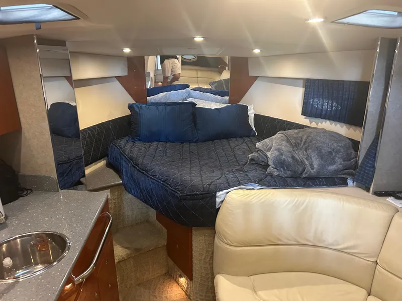Slide: The Image of Interior of a 2007 Formula 31 PC yacht with cozy bed and modern amenities. - 24