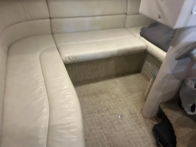 Slide: The Image of 2007 Formula 31 PC interior with beige leather seating and carpeted flooring. - 25