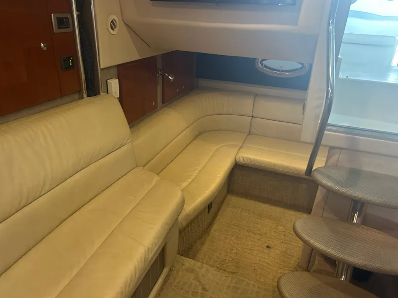 Slide: The Image of Luxurious interior of a 2007 Formula 31 PC yacht with beige leather seating. - 27