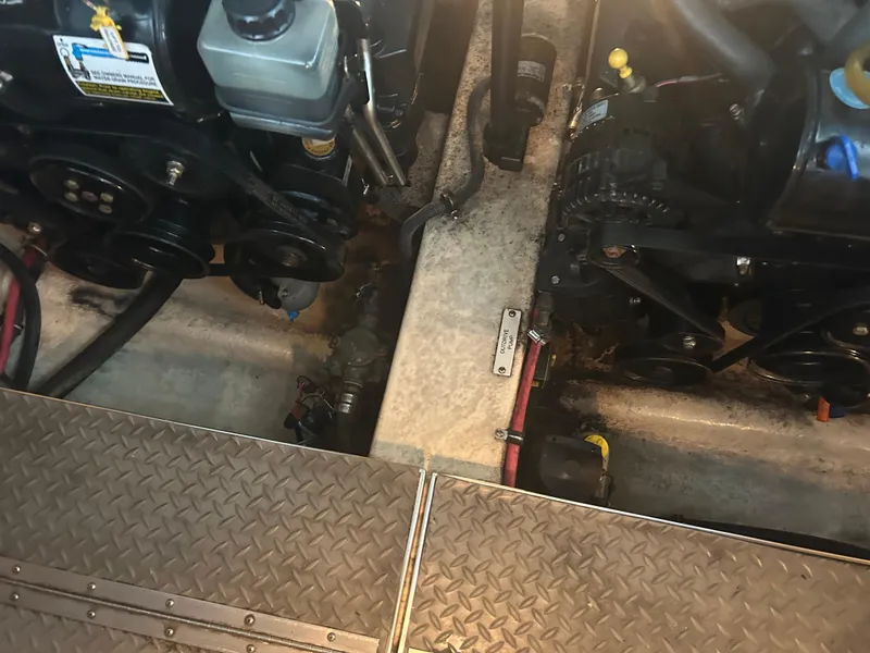 Slide: The Image of Engine compartment of a 2007 Formula 31 PC boat, showing mechanical components and wiring. - 37