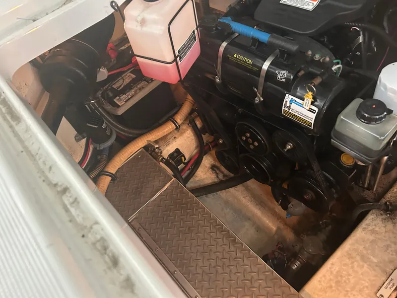 Slide: The Image of Engine compartment of a 2007 Formula 31 PC boat, showing various components and wiring. - 38