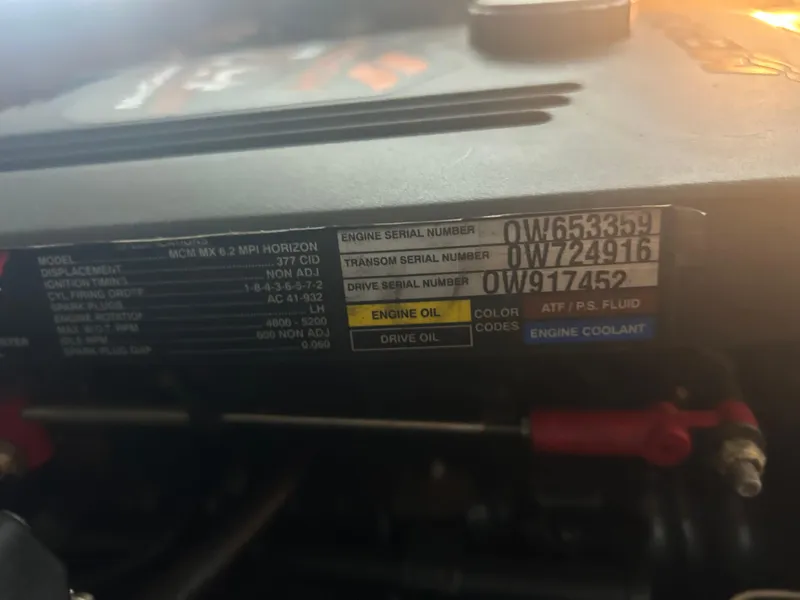 Slide: The Image of Close-up of a 2007 Formula 31 PC engine serial number label. - 41