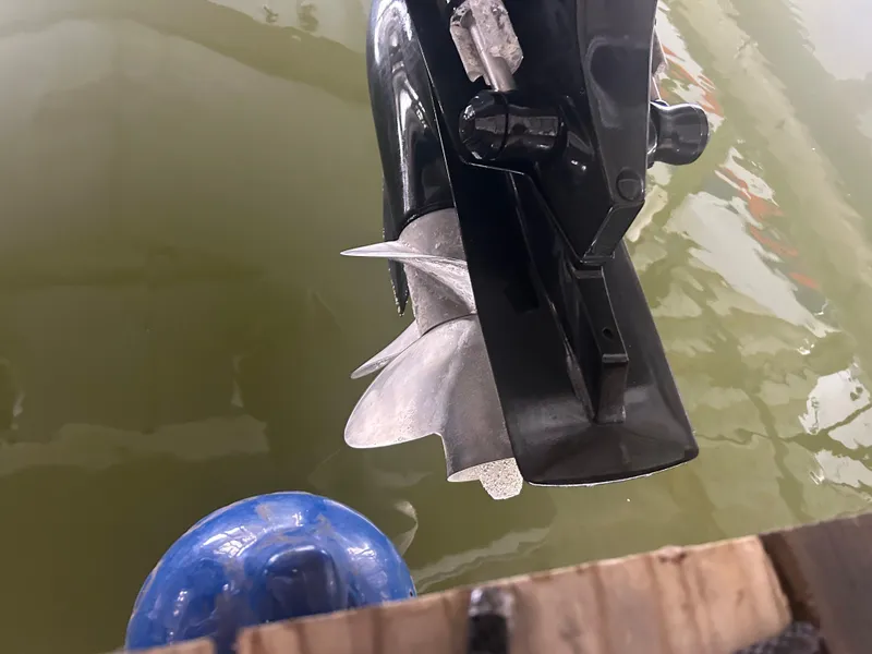 Slide: The Image of Close-up of a 2007 Formula 31 PC boat propeller in water. - 7