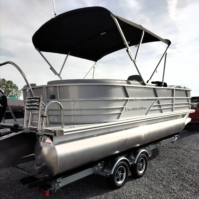 Slide: The Image of 2024 Berkshire 22RFX CTS 2.75 Performance pontoon boat with canopy on trailer. - 8