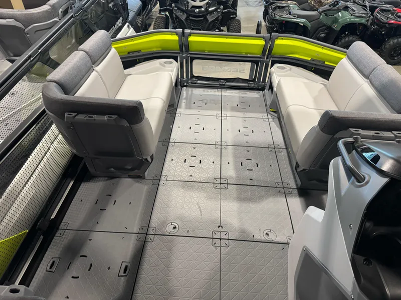Slide: The Image of Interior of 2025 Sea-Doo Switch Cruise 18 with spacious seating and modern design. - 11