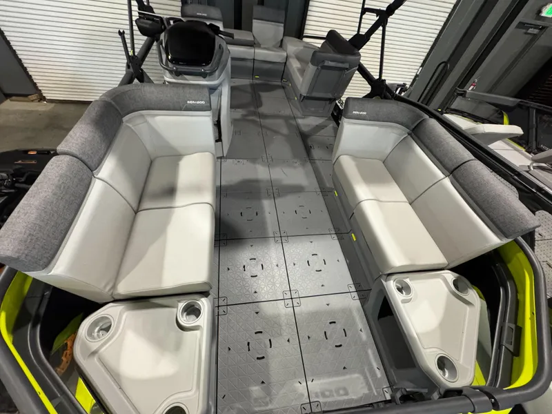 Slide: The Image of 2025 Sea-Doo Switch Cruise 18 interior with spacious seating and cup holders. - 2