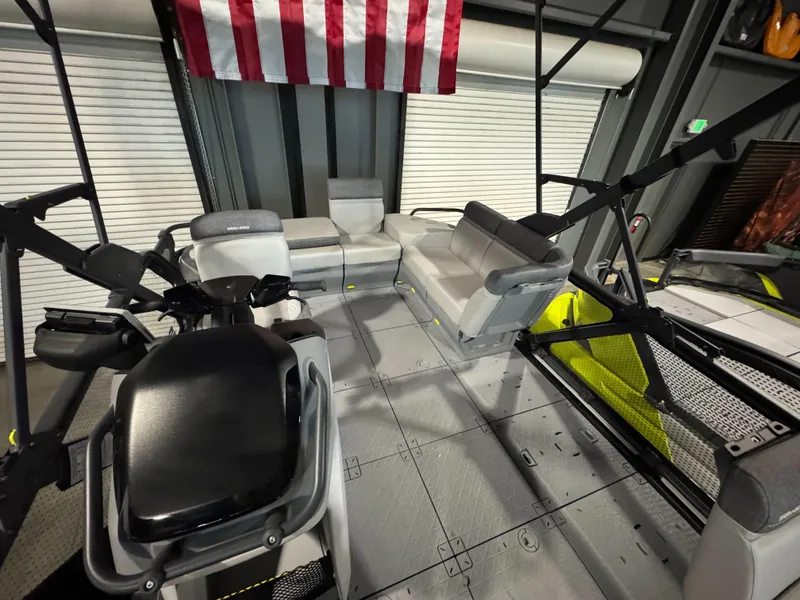 Slide: The Image of Interior of 2025 Sea-Doo Switch Cruise 18, featuring spacious seating and modern design. - 3
