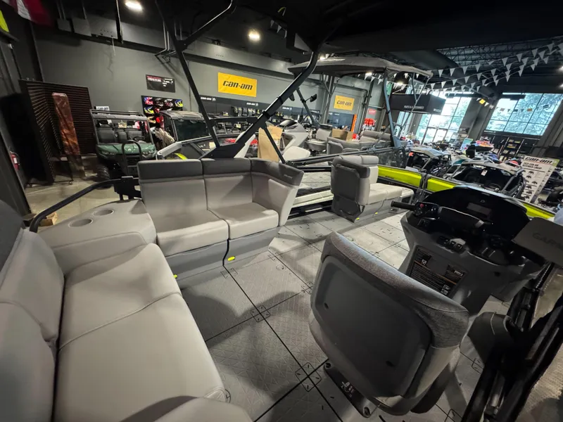 Slide: The Image of 2025 Sea-Doo Switch Cruise 18 interior with spacious seating in a showroom. - 6