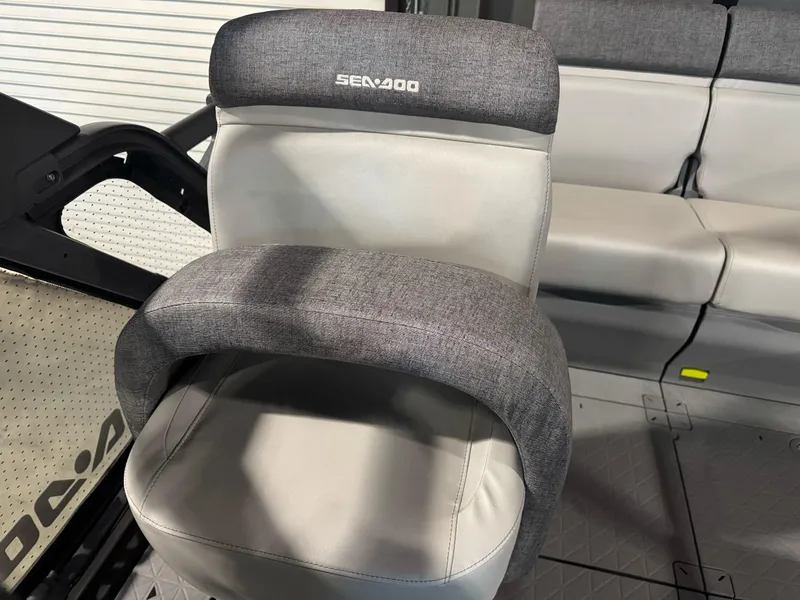 Slide: The Image of 2025 Sea-Doo Switch Cruise 18 seat with gray upholstery and modern design. - 8