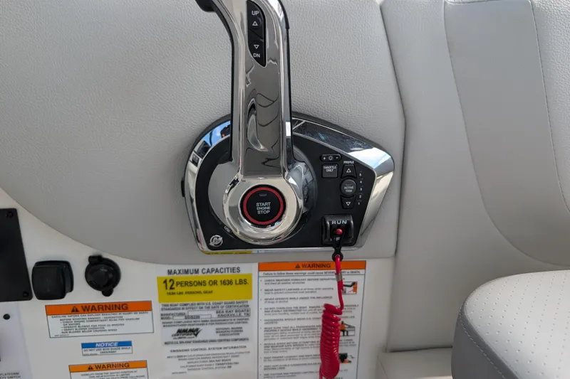 Slide: The Image of Control panel of 2026 Sea Ray SDX 230 Surf boat with start-stop button. - 14