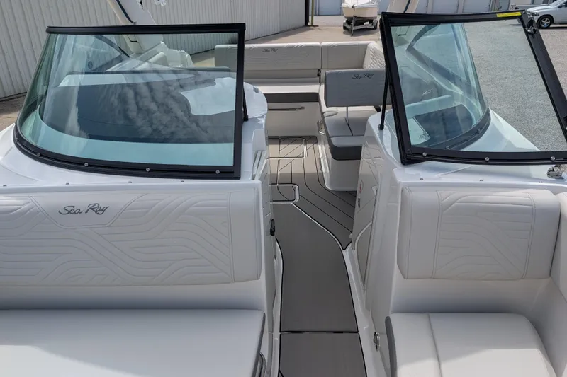 Slide: The Image of 2026 Sea Ray SDX 230 Surf boat interior with sleek seating and modern design. - 18