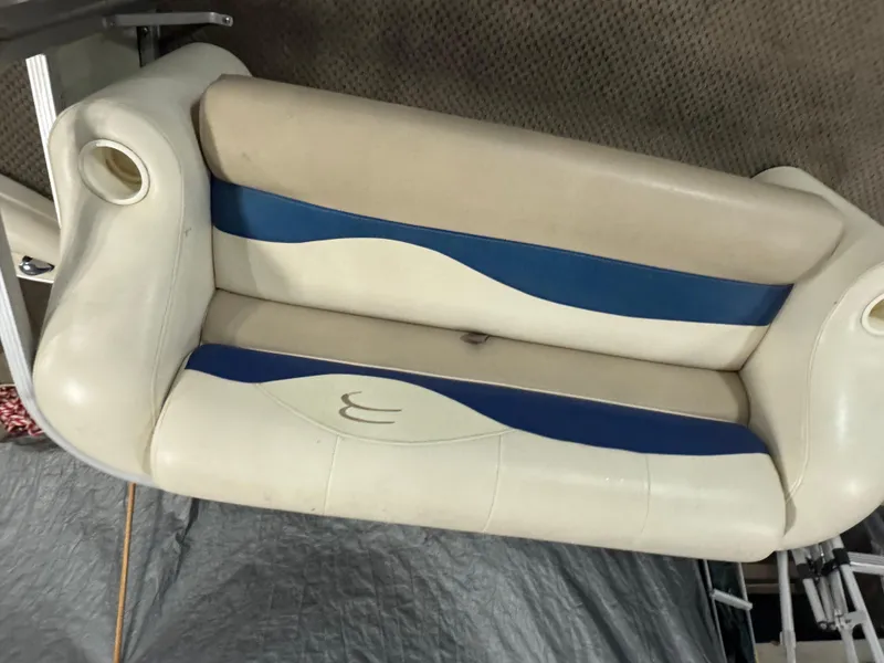 Slide: The Image of 2003 Bennington 205L boat seat with beige and blue upholstery. - 5