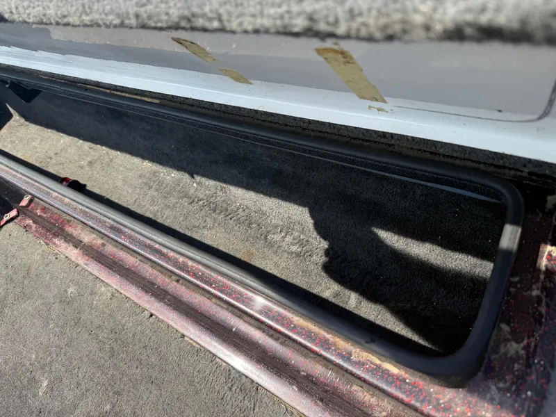 Slide: The Image of Interior view of a 1992 Ranger 320v boat storage compartment. - 8