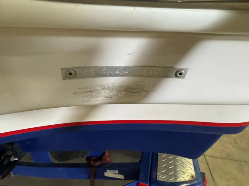 Slide: The Image of 2015 Tahoe 215 Xi boat hull identification number plate. - 5