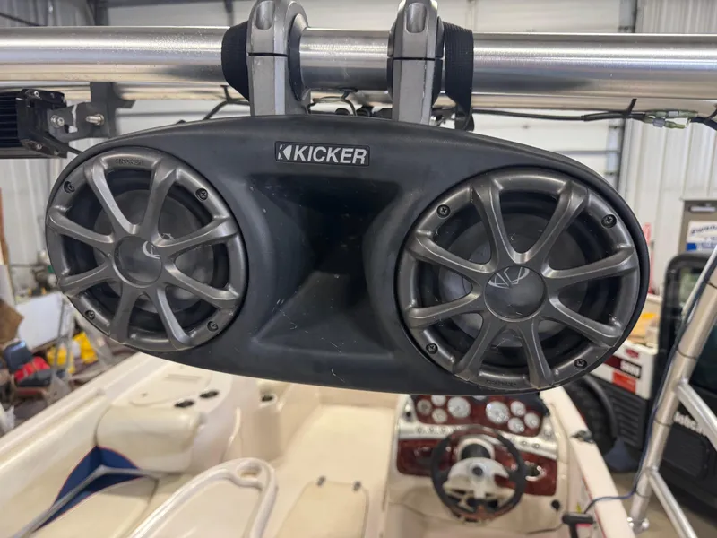 Slide: The Image of Kicker speakers on a 2015 Tahoe 215 Xi boat, interior view. - 7