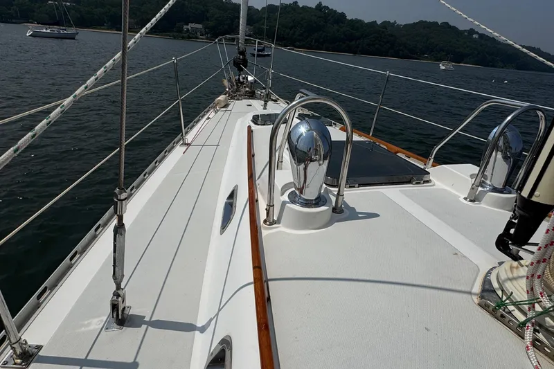 Slide: The Image of Sailing deck of a 1998 Hylas 46 yacht on calm waters. - 24