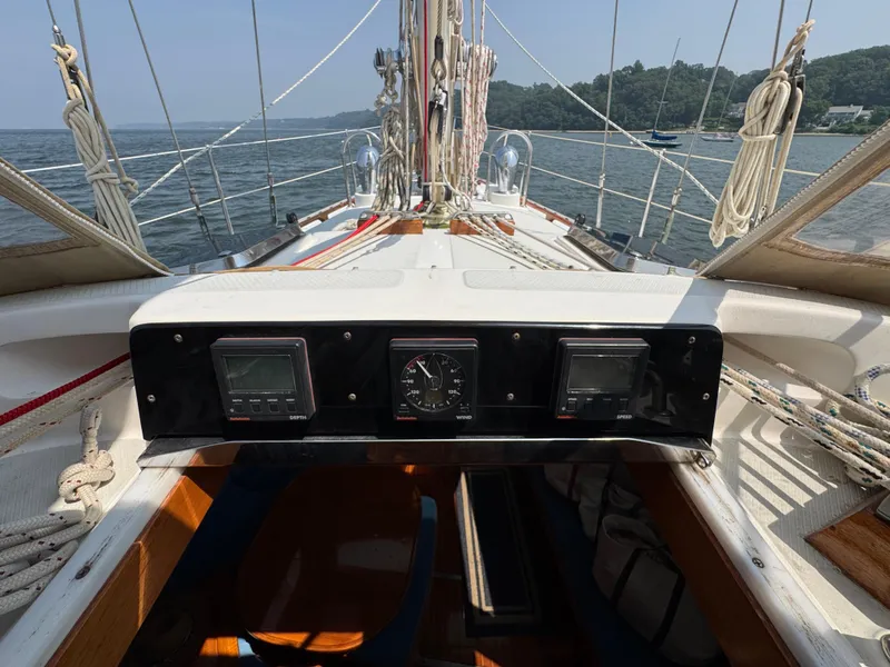 Slide: The Image of Cockpit view of 1998 Hylas 46 sailboat with navigation instruments and rigging. - 3