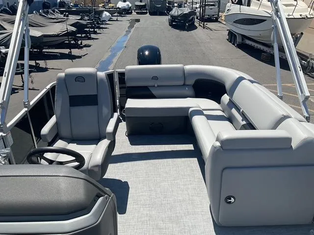 Slide: The Image of 2026 Sun Tracker Party Barge 20 DLX pontoon boat with spacious seating and modern design. - 11