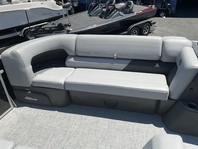 Slide: The Image of 2026 Sun Tracker Party Barge 20 DLX pontoon boat with spacious seating and modern design. - 7