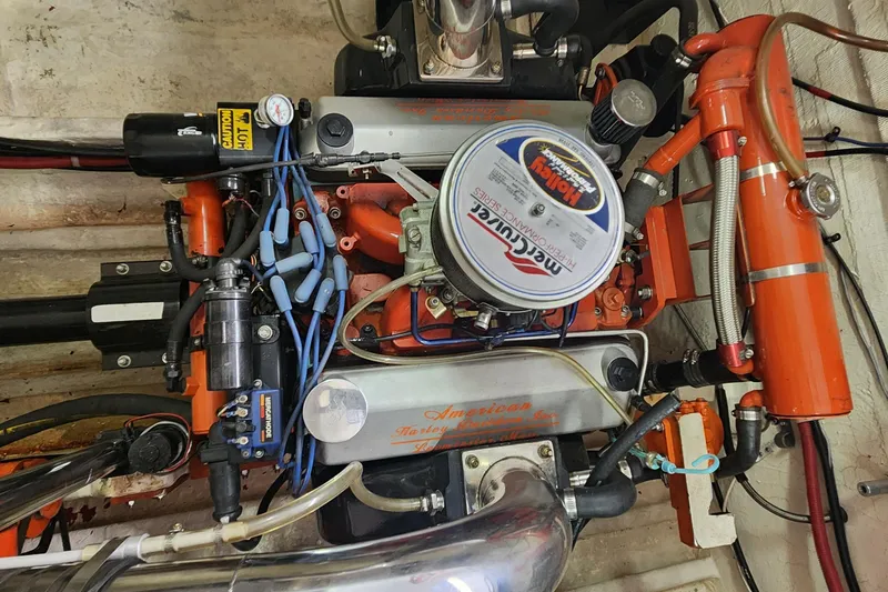 Slide: The Image of Engine of a 1995 Cigarette 38 Signature Edition boat, featuring MerCruiser components. - 25
