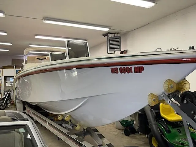 Slide: The Image of 1995 Cigarette 38 Signature Edition boat in garage, side view. - 4