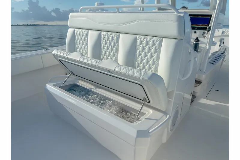 Slide: The Image of Manufacturer Provided Image: 2022 Invincible 33 Catamaran with open ice storage compartment on deck. - 20