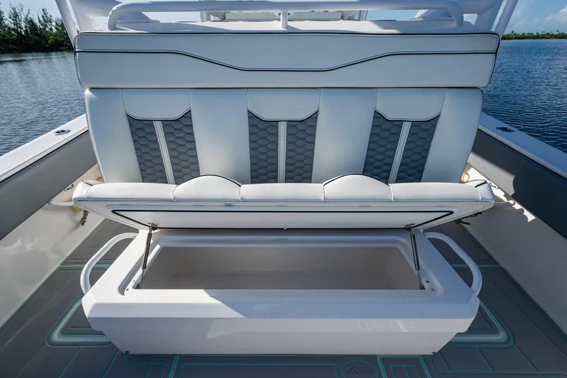 Slide: The Image of 2022 Invincible 33 Catamaran with open storage compartment on deck. - 23