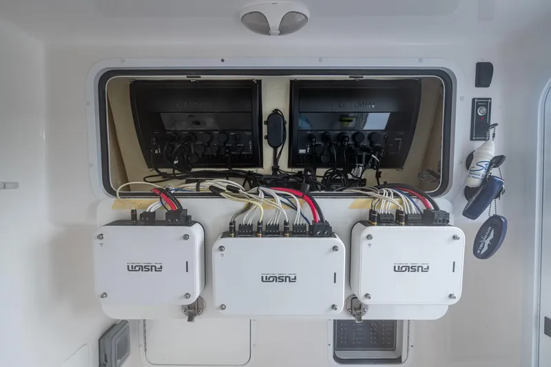 Slide: The Image of Electrical system of 2022 Invincible 33 Catamaran with Garmin and Fusion components. - 31