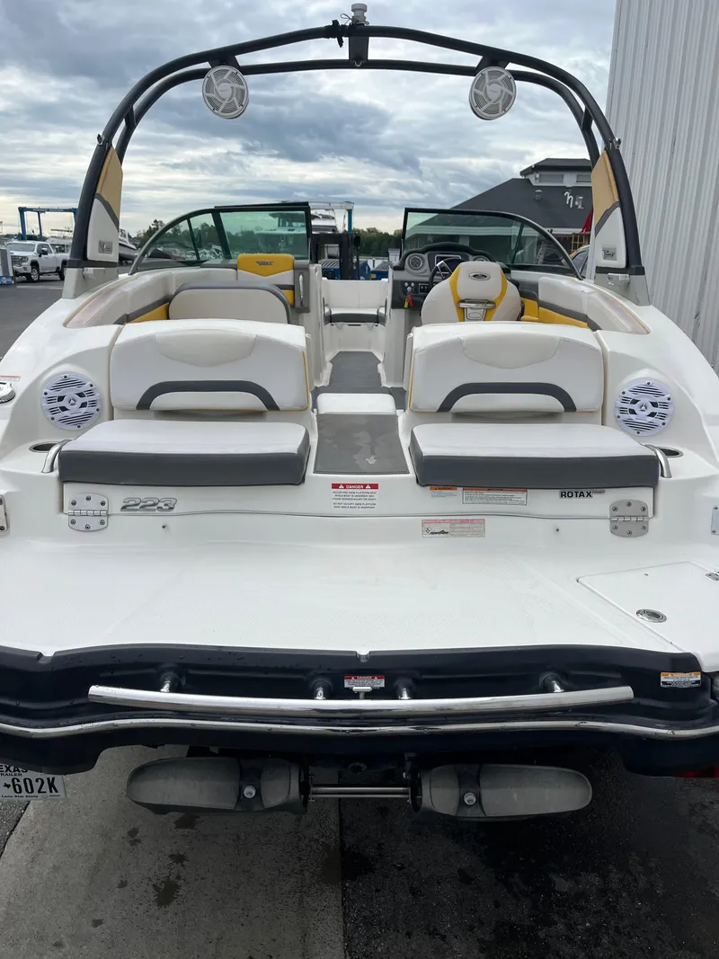 Slide: The Image of 2016 Chaparral Vortex 223 VRX boat, rear view with seating and speakers. - 3