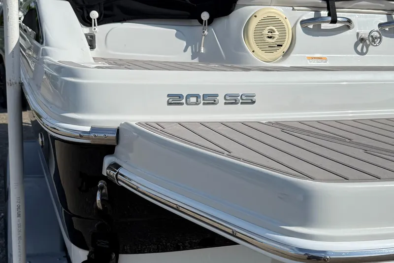 Slide: The Image of 2017 Crownline 205 SS boat rear view with deck and speaker. - 13
