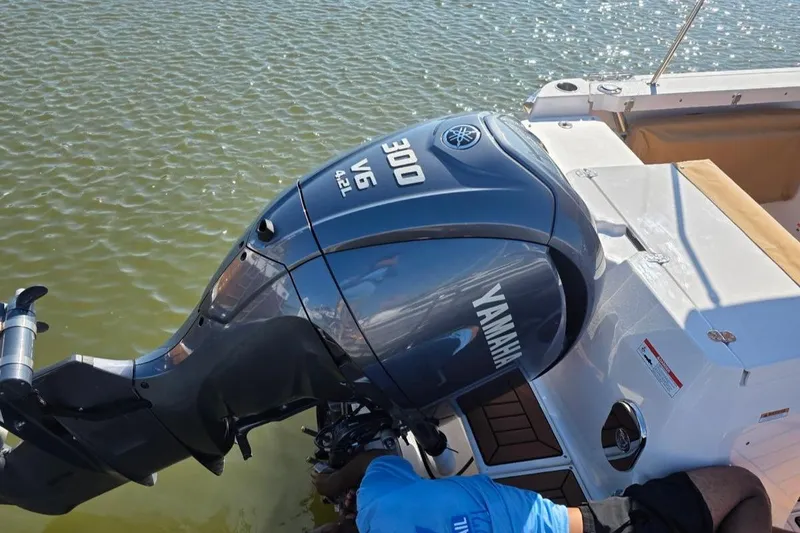 Slide: The Image of 2023 Ranger Tugs R-27 with Yamaha 300 V6 outboard motor on water. - 3
