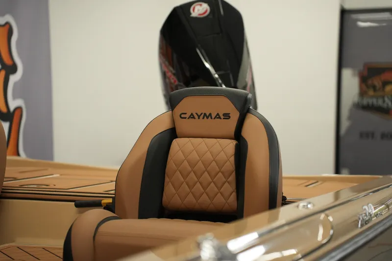 Slide: The Image of 2025 Caymas XS 20 PRO boat engine and transom detail. - 12