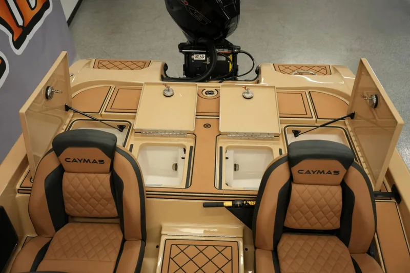 Slide: The Image of 2025 Caymas XS 20 PRO boat seat with tan and black leather design. - 14